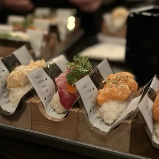 Nori is wrapped. You remove the wraps once you're ready to eat the roll. Clever way to keep the nori crispy!