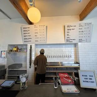 a man standing at a counter