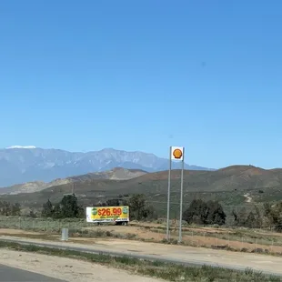 a sign on the side of the road