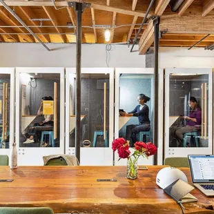 Over a dozen privacy pods throughout the space