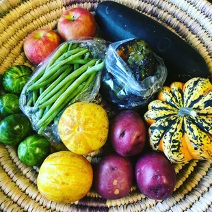 A November 2018 Classic Share: acorn squash, lemon cucumbers, potatoes, apples, green tomatoes, zucchini, green beans, roasted bell peppers