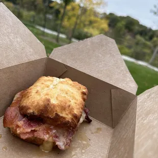 Enjoying a Breakfast biscuit in the cool, fall weather.
