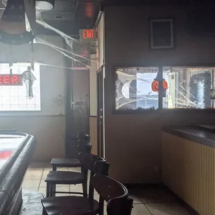 a cat sitting on the bar
