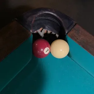 a billiards shot on a pool table