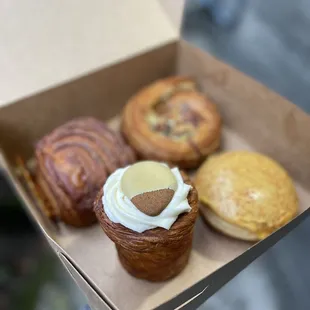 Ham and cheese, quiche Lorraine croissant, passion fruit cruffin, mango pineapple brioche donut