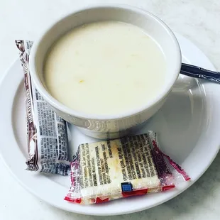 Clam chowder soup served with a deluxe sandwich