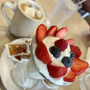 a dessert with strawberries and blueberries