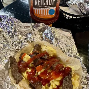 Steak and Egg Taco. I added spicy ketchup. So good!