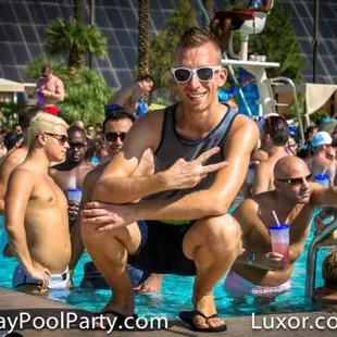 a group of people in the pool