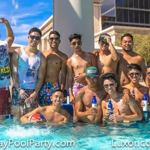 a group of men posing for a picture
