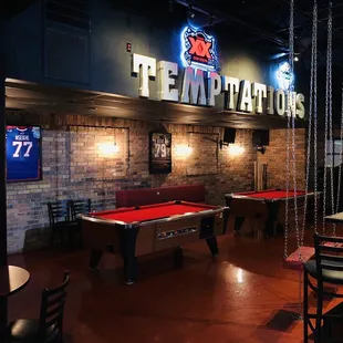 a pool table and a bar