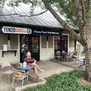 a woman sitting at a table