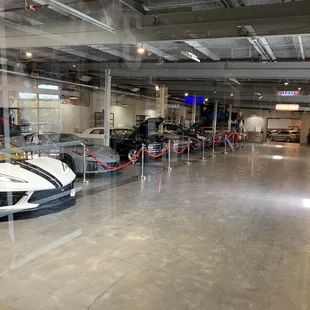 Inside the coffee shop there is a glass garage door to look into Octane Restoration shop.