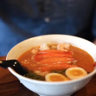 a bowl of soup and a plate of food