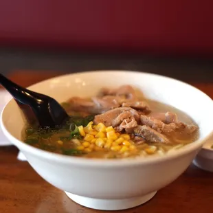 a bowl of soup with a spoon in it