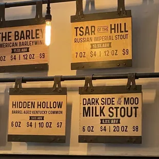 signs hanging from the ceiling