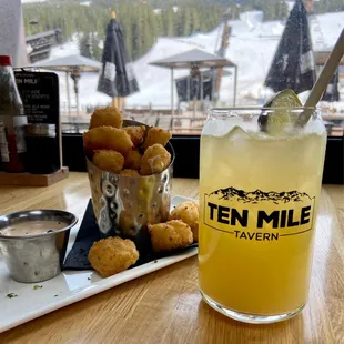 Crispy Cheese Curds! These are lightly battered fried cheese bites with tomato horseradish aioli. Some of the best Ive had!