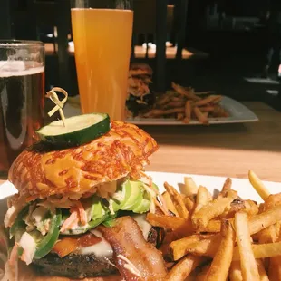 a burger and fries on a plate