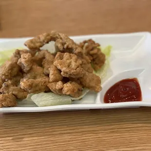 Fried pork.  Get it after you ride the Tilt-a-Whirl!  Then cotton candy!  Kidding.  It's good!