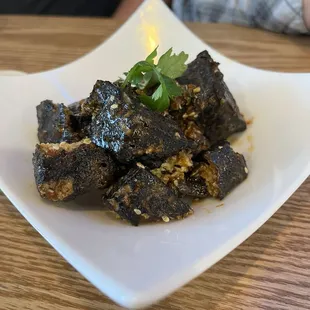 This is the "Stinky Tofu with Spicy Sauce".  It wasn't really stinky.