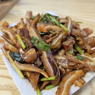 a plate of stir fried noodles