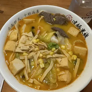 Pickled Pepper Rice Noodle Soup with beef tendon and fish tofu addition