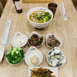 Picked cabbage fish rice noodles 酸菜鱼米线 with some side dishes