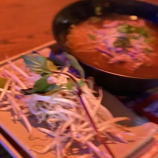 a bowl of soup on a plate