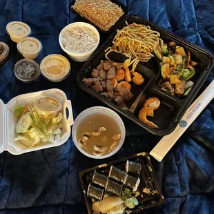 H18. Hibachi Filet Mignon and Shrimp Combo with the included onion soup and salad  Salmon roll Fried rice Sushi rice