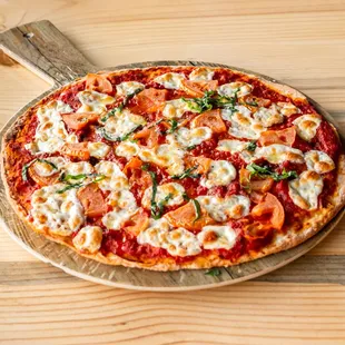 a pizza on a wooden table