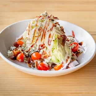 a salad with lettuce and tomatoes