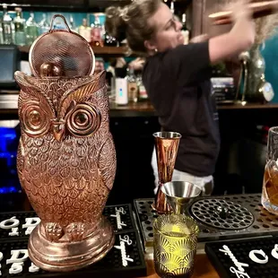 Hadley making Kristen's martini.