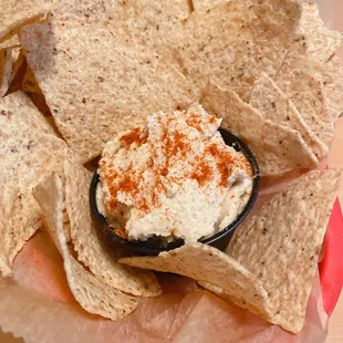 a bowl of chips and dip