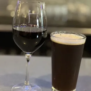 a glass of wine and a glass of beer