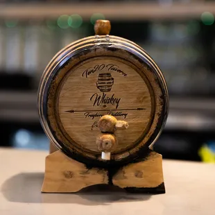 a barrel of whiskey on a table
