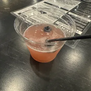 Drinks in plastic cups. Compare the drink to the description on the menu it&apos;s missing all the garnish ! And in a plastic cup !