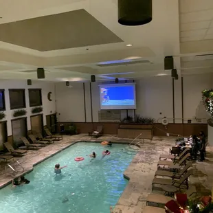 Indoor pool family movie night. Water is very warm!