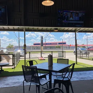 Front patio, screen in the shade, cornhole, ring-peg.