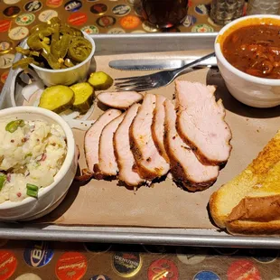 Tender Smokehouse Aubrey, smoked turkey breast, sliced. BBQ Beans. Side of Potato Salad, extra.