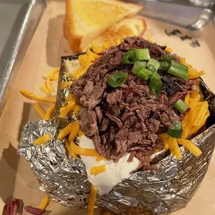 Loaded baked potato with brisket! Amazing