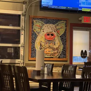 Pig art made from bottle caps