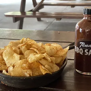 Complimentary BBQ kettle chips are served while you wait for your order.
