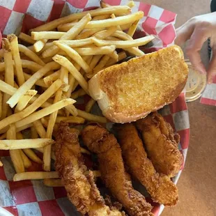 a basket of fried chicken and french fries