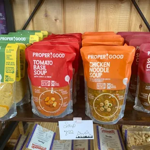 a variety of soups on a shelf