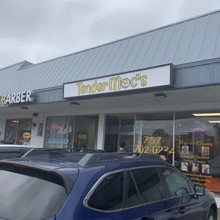 a car parked in front of a store