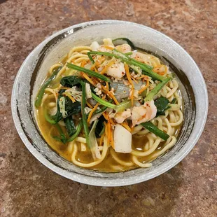 Combination seafood soup noodles