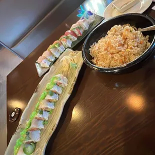 Shrimp fried rice so damn good green bottom left is lohi roll straight  and rainbow roll as good as could be.