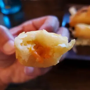 Interior of harumaki ($5). Terrible. Smelled weird. Buttery and sour flavor. Gave up after two bites.