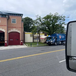 a truck parked in front of a building