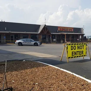 Local constable keeping watch over this iconic pit stop while they rebuild from a fire.